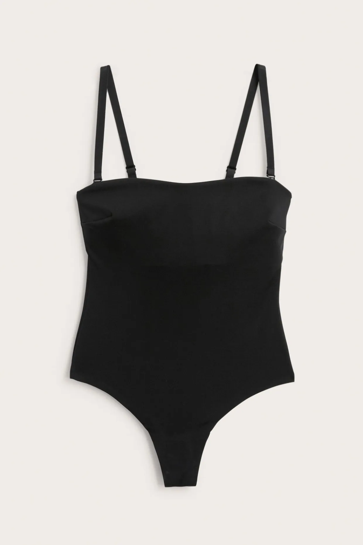 Body ze stringami, lekko modelujące, z wyściełanymi miseczkami