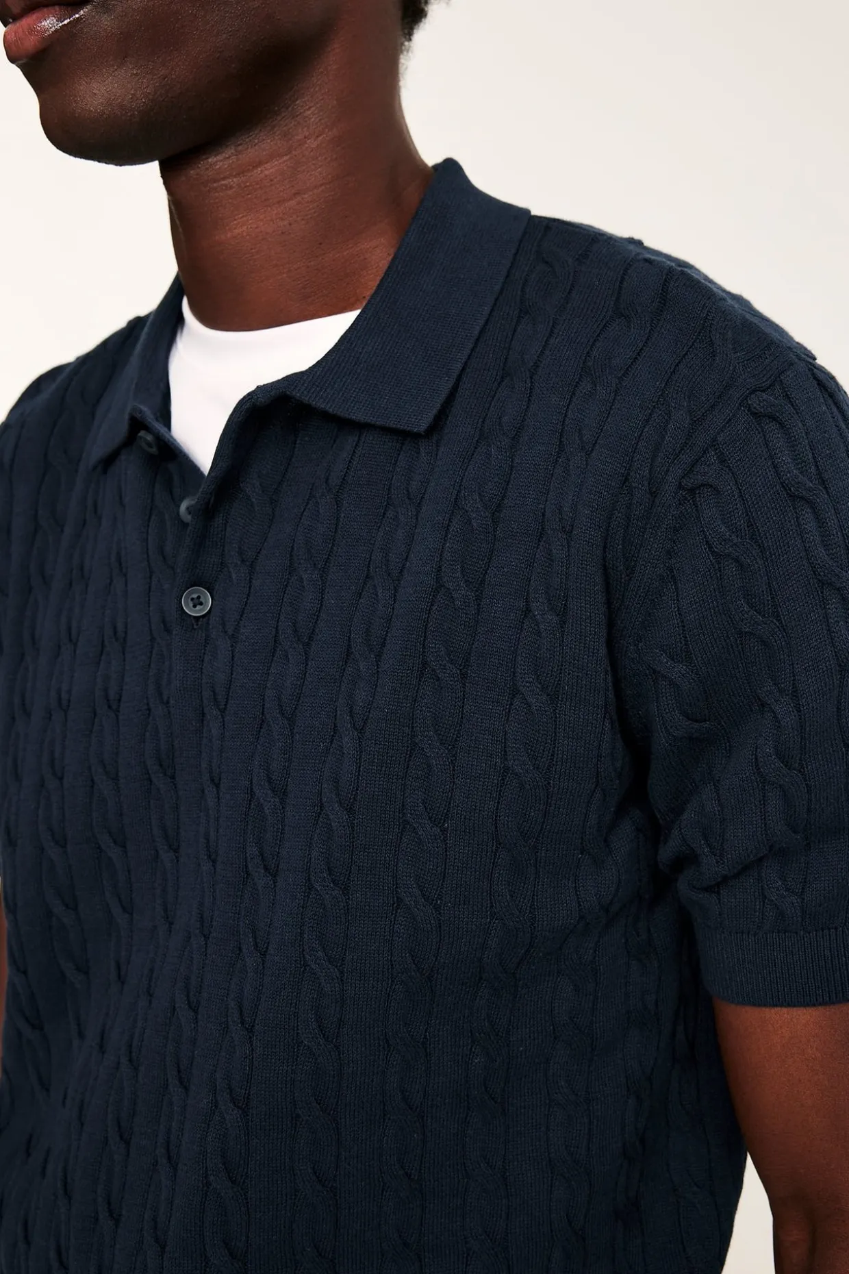 Dzianinowy sweter polo z wzorem warkoczowym