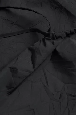 Koszulka z drapowanymi detalami
