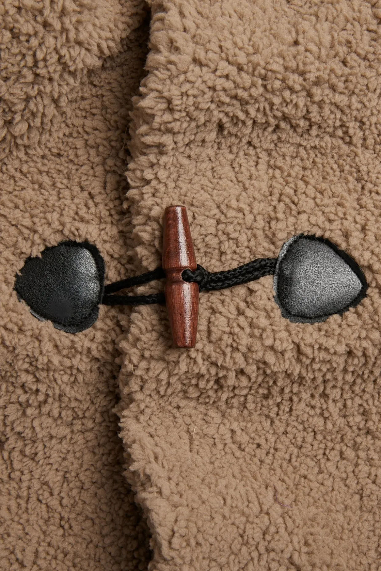 Kurtka pluszowa z guzikami kołkami