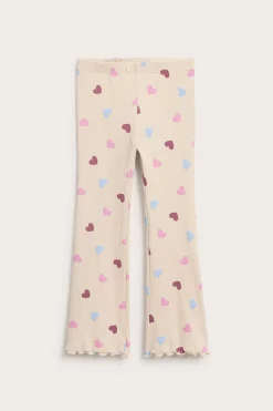 Legginsy dzwony z wzorem w serca