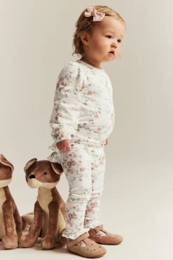Legginsy w kwiaty, z falbanami
