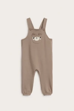 Ogrodniczki z motywem misia na przedniej kieszeni
