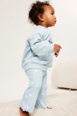 Rozkloszowane legginsy w serduszka