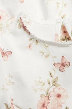 Top peplum w kwiaty i motyle
