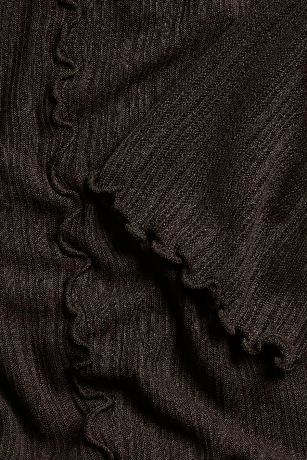 Top z krawędziami typu baby overlock